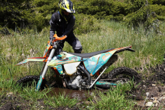 motorcycle stuck in the mud